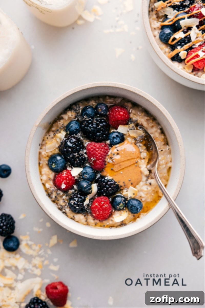 A bowl of Instant Pot Oatmeal topped with vibrant mixed berries, invitingly ready for breakfast.