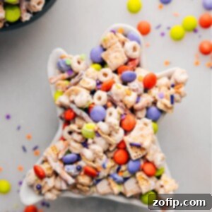 Creature Crunch 3 Finished Monster Munch snack mix on a baking sheet, ready to be broken into pieces.