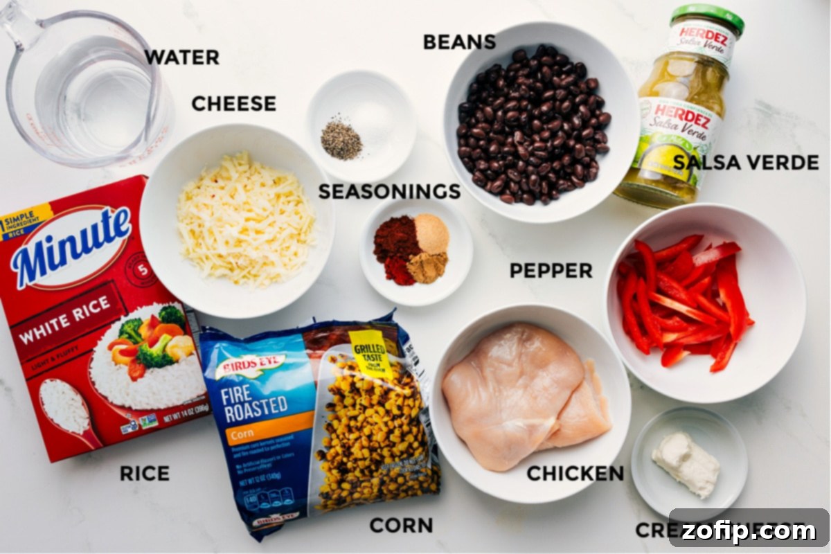 All the ingredients prepped and ready for easy assembly, including water, rice, cheese, corn, spices, beans, chicken, salsa verde, cream cheese, and peppers.