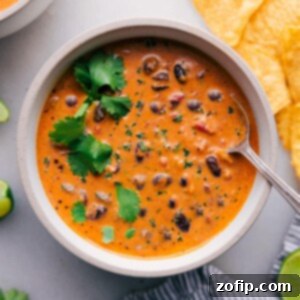 Overhead view of a bowl filled with Pumpkin Black Bean Soup