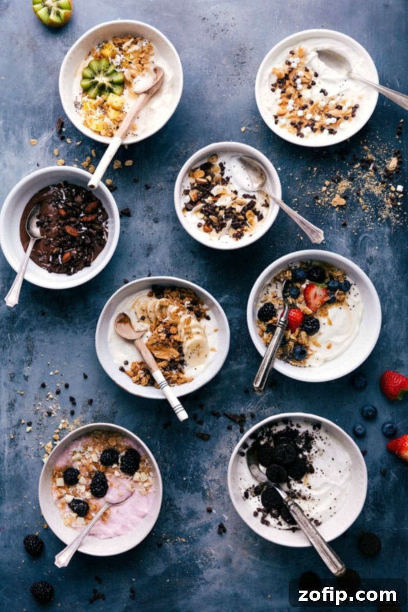 Eight vibrant and enticing yogurt bowls, each beautifully topped with a variety of fresh fruits, nuts, and granola, ready to be enjoyed as a healthy and delicious meal.