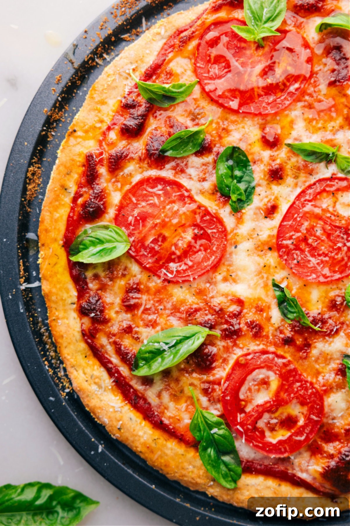 Get ready for a feast with this No-Yeast Pizza! Mangia! Overhead view of a beautifully topped pizza made with No-Yeast Pizza Dough, ready to be enjoyed.