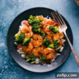 Close-up of Honey Garlic Shrimp with broccoli, showcasing the glossy sauce and tender shrimp.