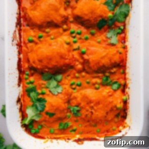 Easy One-Pan Tikka Masala 2 One pan tikka masala freshly out of the oven, warm and covered in delicious sauce.