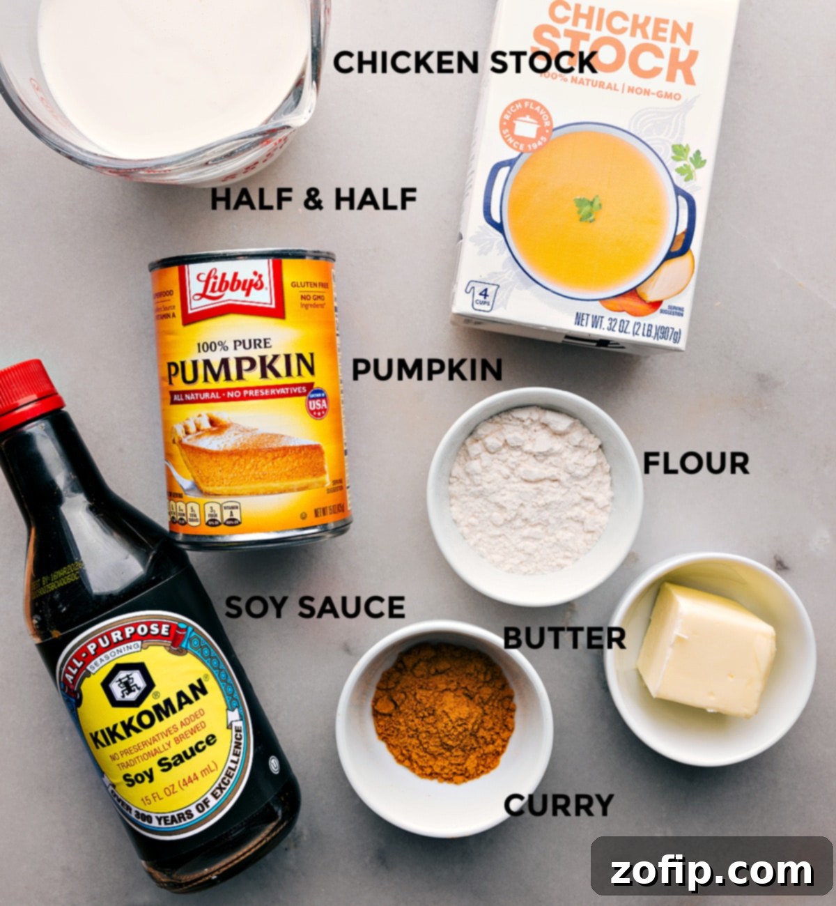 5-Ingredient Pumpkin Curry Soup All the core ingredients for Pumpkin Curry Soup laid out neatly on a kitchen counter, ready for preparation.