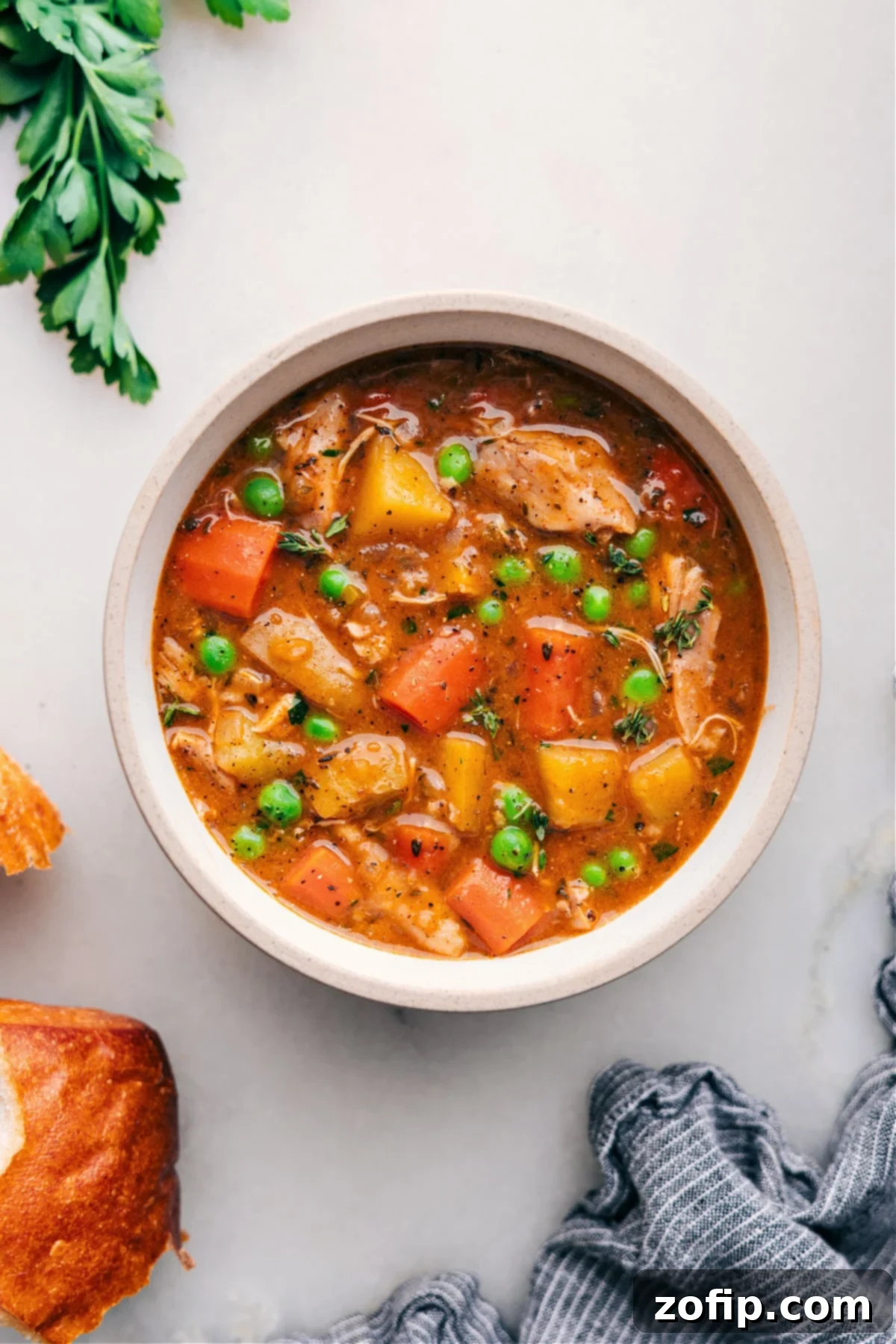 Crockpot Chicken Stew For dinner Bowl of the soup ready to be enjoyed.