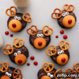 Christmas Reindeer Delights 2 Adorable and delicious cookies decorated to resemble reindeer, making a perfect festive dessert.