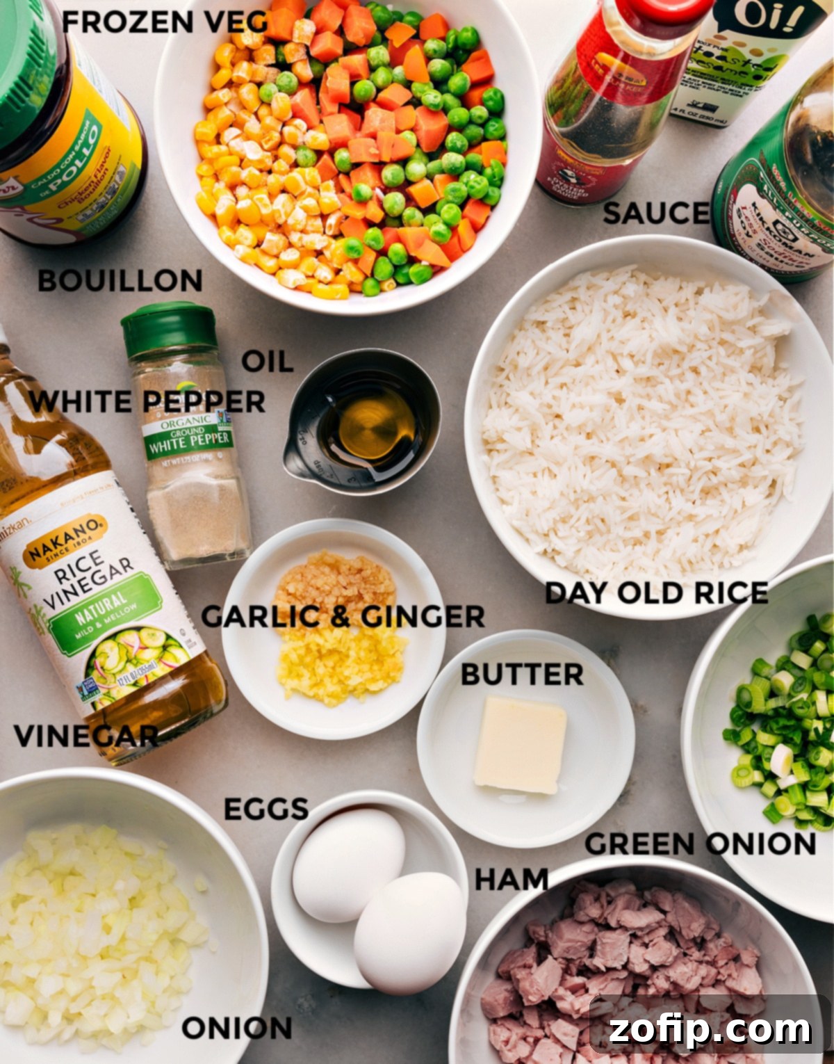 Essential Ingredients for Ham Fried Rice All the fresh ingredients for Ham Fried Rice, meticulously prepped and laid out on a cutting board, ready for cooking.