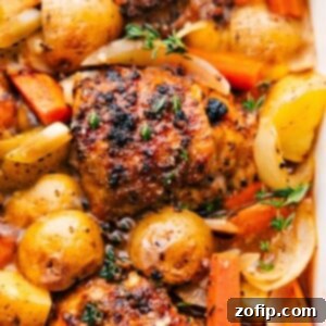 One Pan Chicken and Potatoes fresh out of the oven, golden brown.