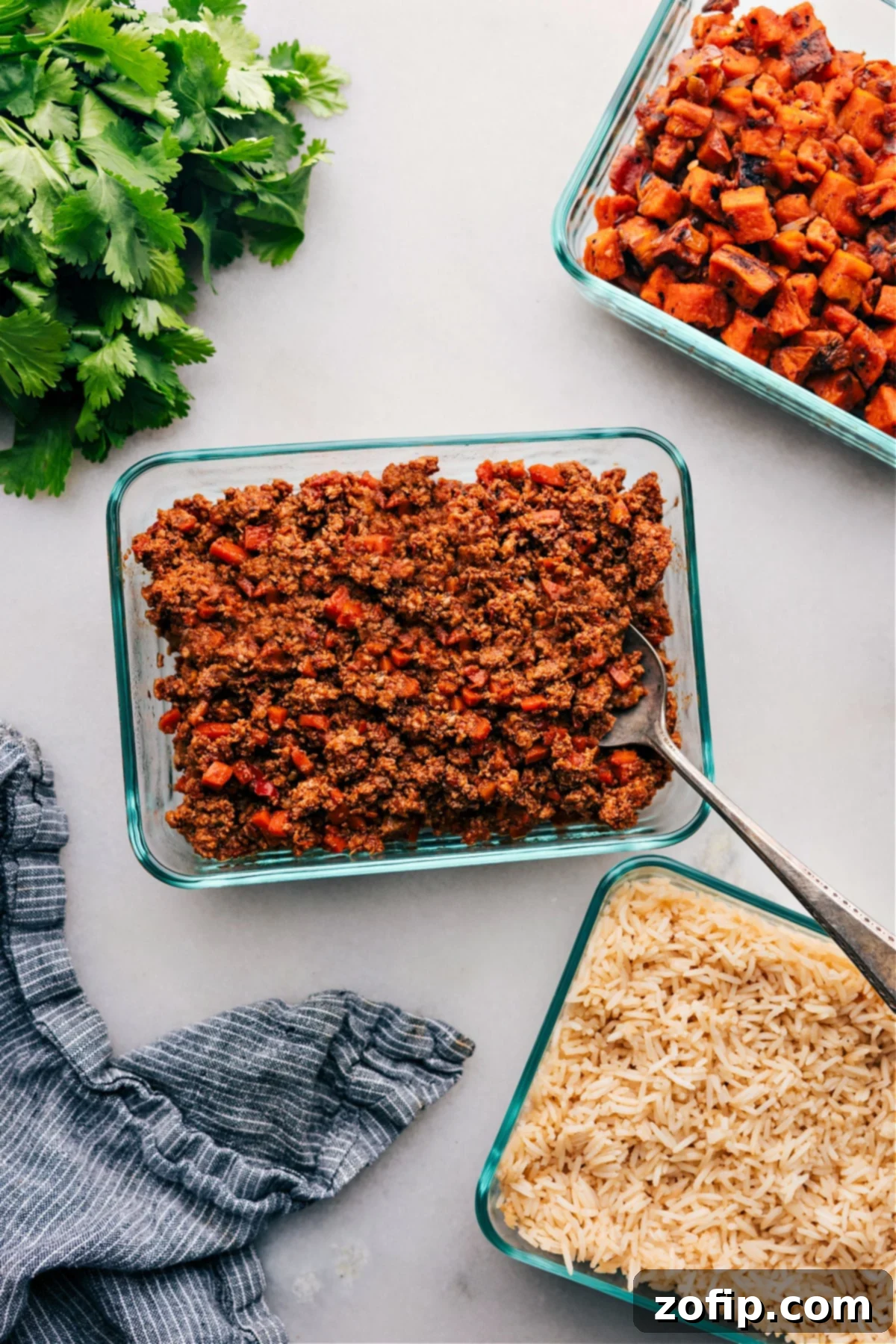 Flavorful Ground Turkey Meal Prep ready for portioning into containers, surrounded by fresh ingredients.