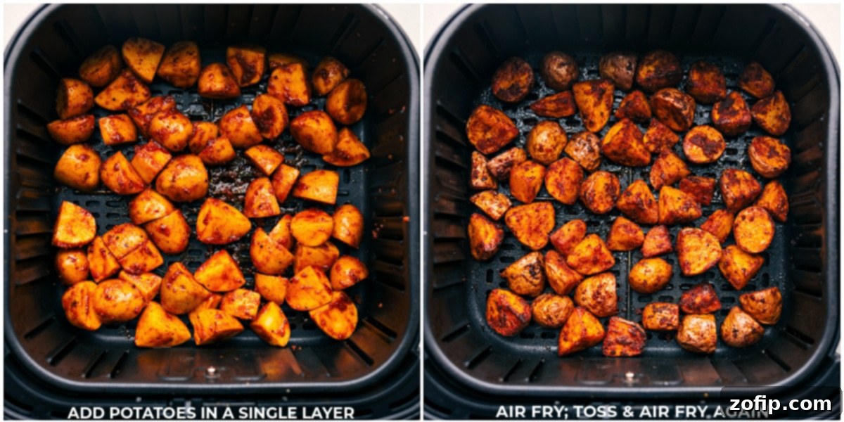 Delicious Air Fryer Potatoes Cooking Perfectly golden-brown and crispy Air Fryer Potatoes cooking in a single layer within the air fryer basket, ensuring even heat distribution.