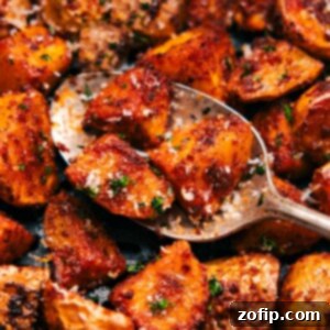 Perfectly Crispy Air Fryer Potatoes 2 Up close spoonful of the recipe ready to be served.