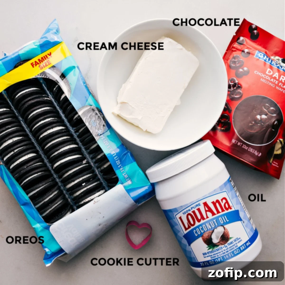 All the essential ingredients for making Heart Oreo Truffles beautifully prepped and laid out for easy assembly.