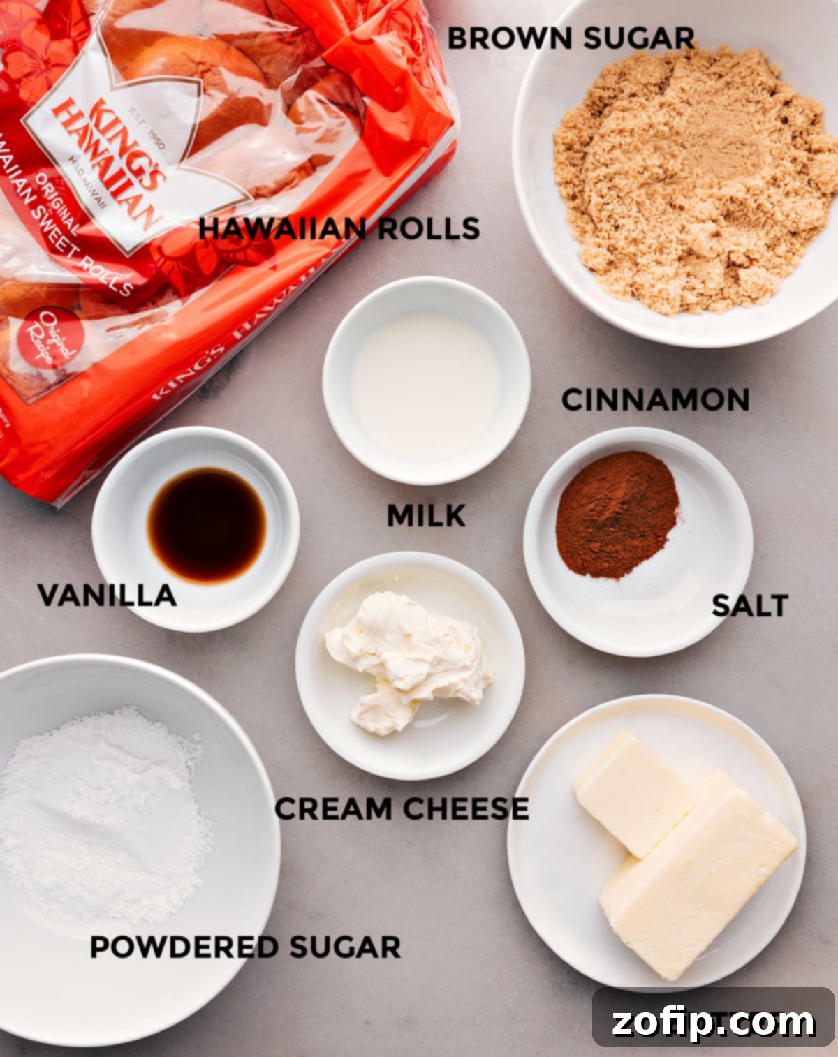 All the essential ingredients for Hawaiian Roll Cinnamon Rolls laid out neatly on a table, ready for preparation.