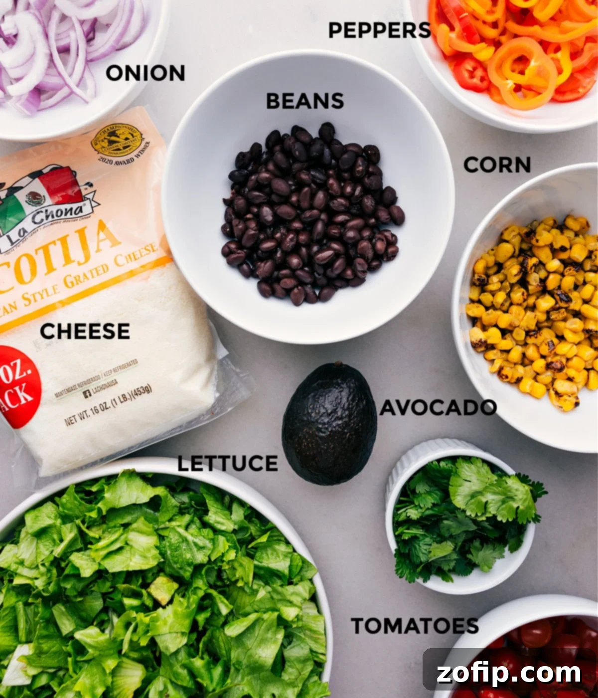 All the fresh ingredients for the Mexican Salad recipe, meticulously prepped and laid out for easy assembly.
