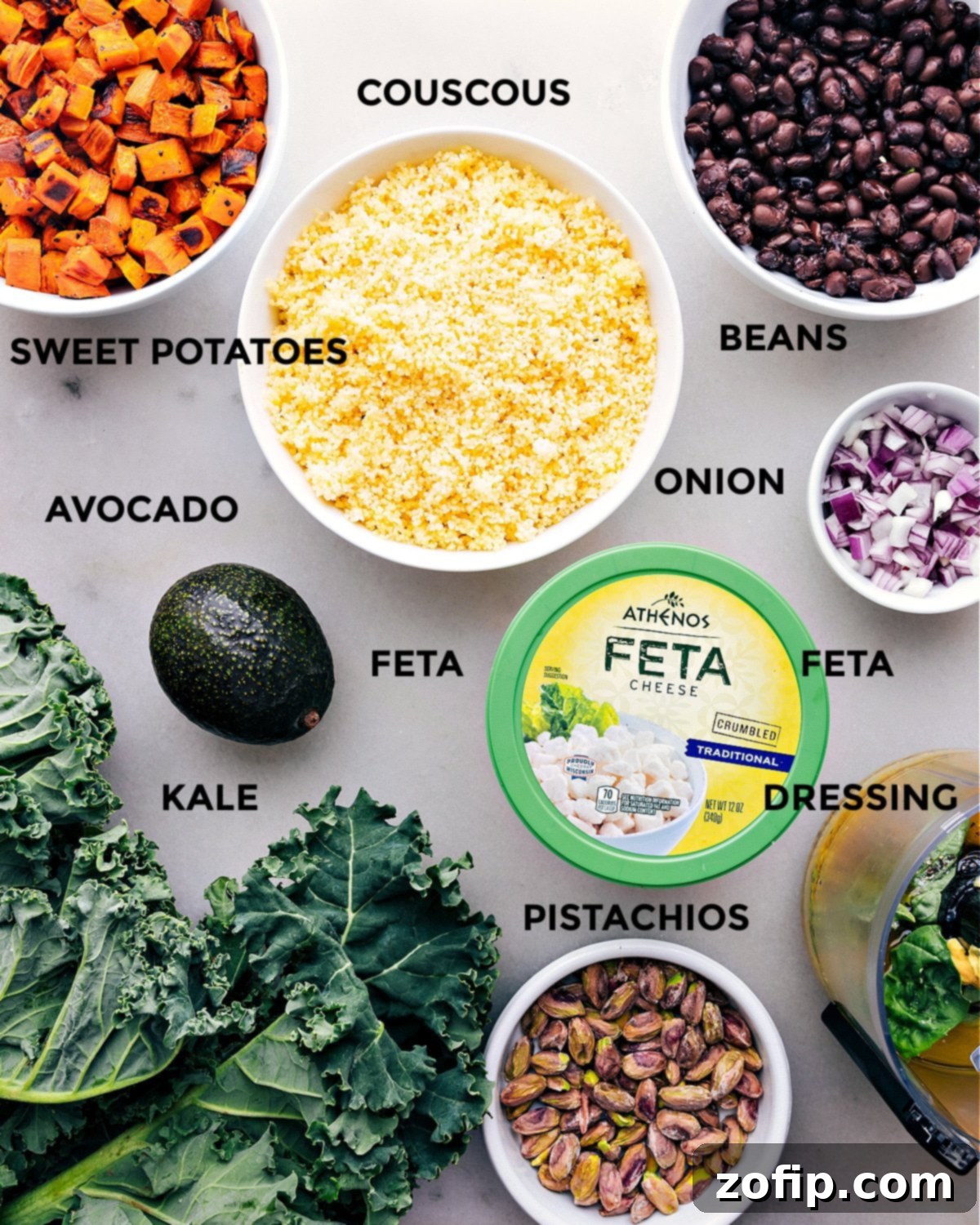 All the fresh ingredients for Kale Sweet Potato Salad meticulously prepped and arranged, ready for assembly.