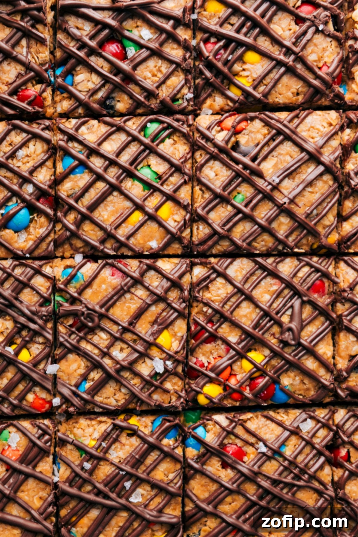 A freshly prepared and cut no-bake energy bar snack, ready to be enjoyed as a quick and healthy treat.