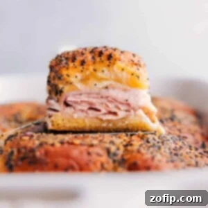 Turkey Sliders fresh out of the oven, golden and cheesy.