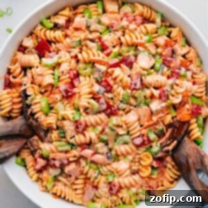 Buffalo Chicken Pasta Salad Recipe Image Buffalo Chicken Pasta Salad in a bowl, a close-up shot showcasing the textures and colors.