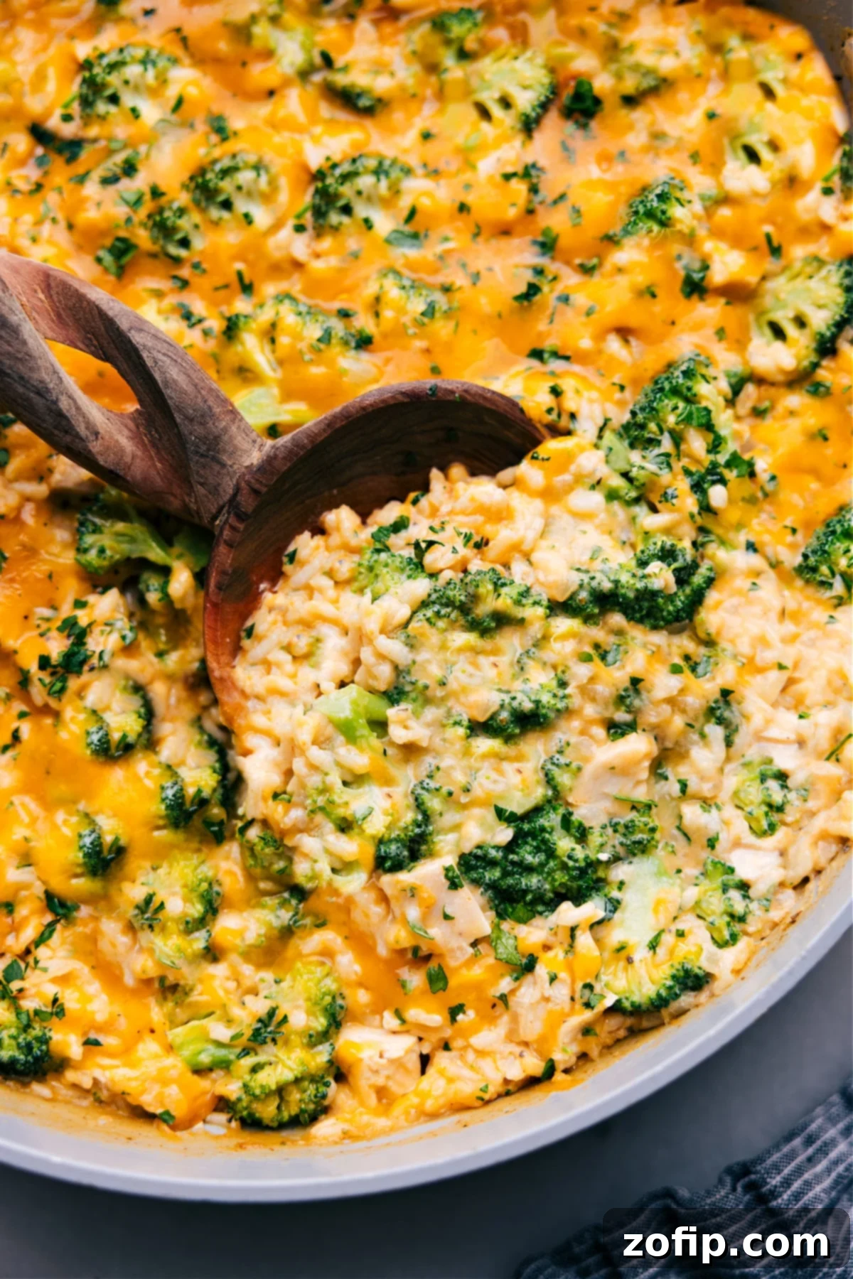 A big spoonful of the dish being scooped out to serve.