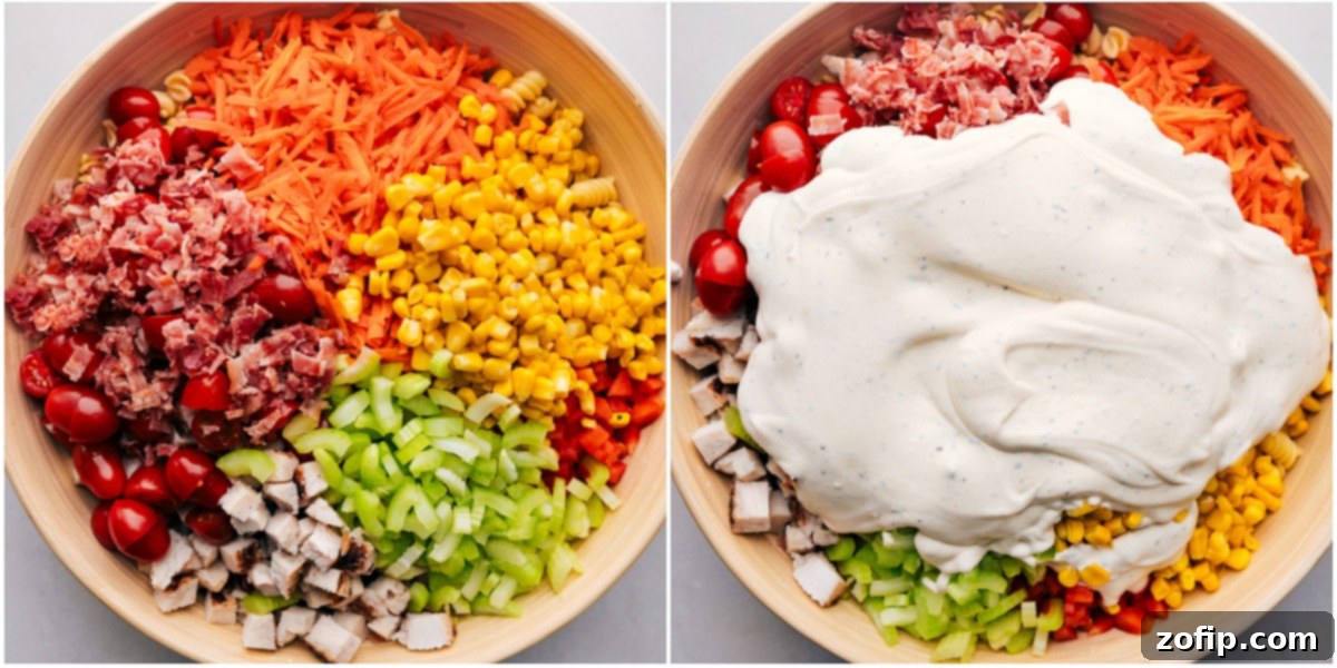 A vibrant mix of chicken, pasta, and fresh vegetables being tossed with creamy dressing in a large bowl, showcasing the deliciousness of this favorite chicken pasta salad recipe.