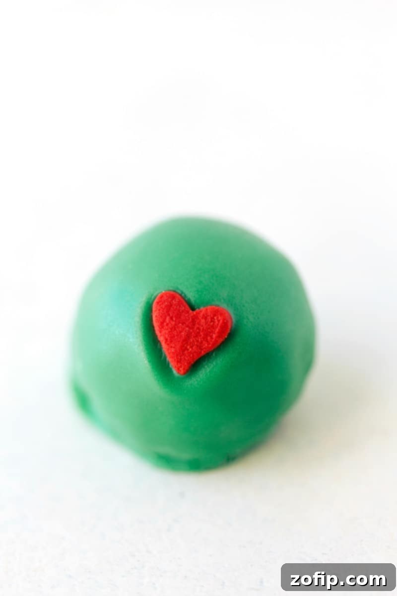 Five different ways to dress up an OREO Cookie truffle for Christmas! Image of the Christmas Heart Oreo truffle, a sweet and simple holiday treat