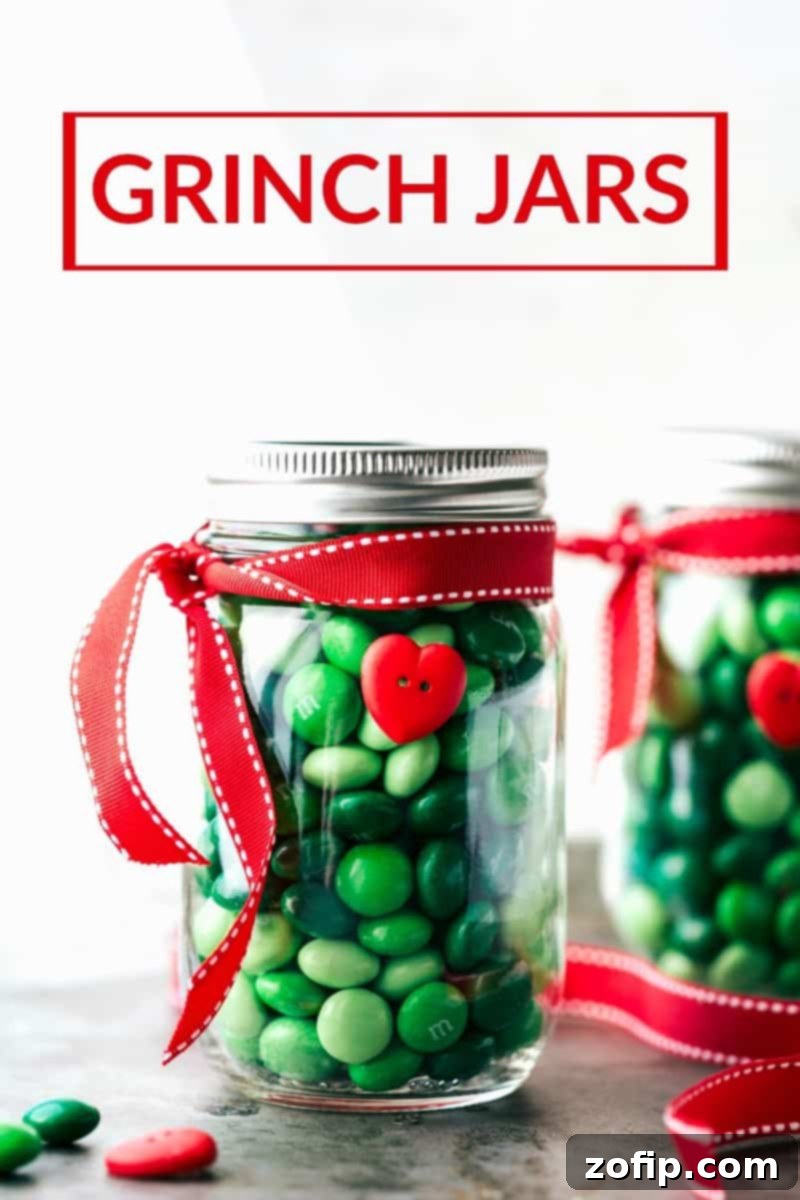 Image of the Grinch jars that go along with these Christmas mason jar gift ideas
