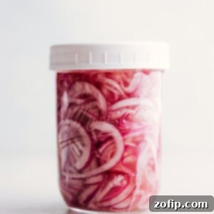 Vibrant Pickled Red Onions 3 Pickled Red Onions recipe in a jar.