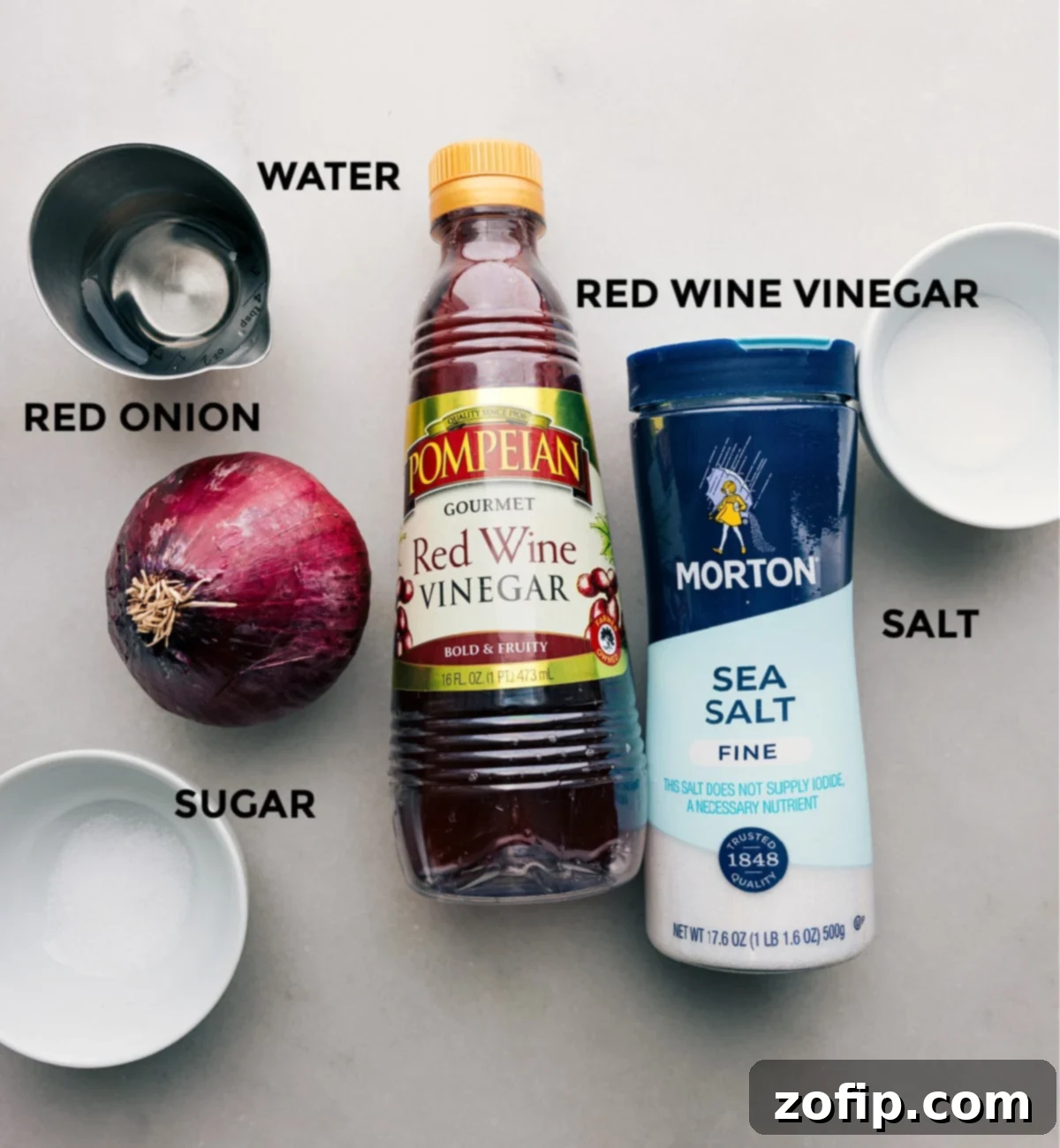 Ingredients For Pickled Red Onions All ingredients for quick pickled red onions prepped and ready for assembly.