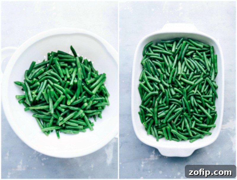 Fresh, vibrant green beans being carefully added to a baking dish, preparing for the homemade green bean casserole.