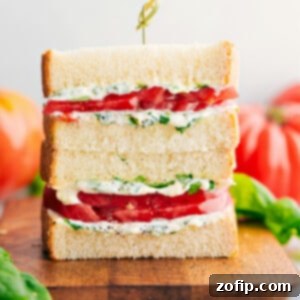 Tomato Sandwich stacked on top of each other showing the delicious inside.