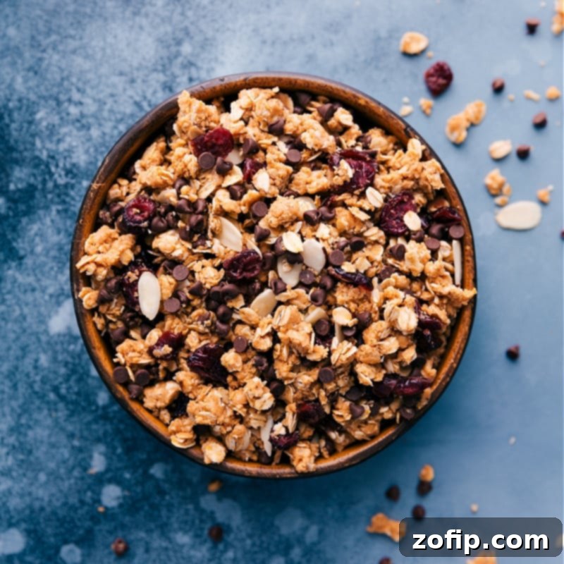Enjoying No-Bake Granola: A versatile and delicious snack perfect for any time of day. A bowl of freshly made No-bake Granola, highlighting its crumbly texture and various mix-ins.