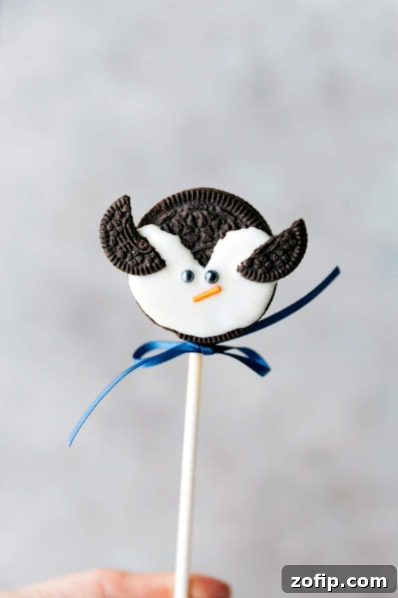 Image of the Penguin Oreo Pop, an adorable Christmas treat made with Oreos and white chocolate.