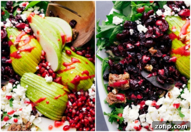 Pear and Pomegranate Salad with Dried Cherries and Dressing A vibrant pear salad featuring thinly sliced pears, jewel-toned pomegranate arils, and dried cherries, all lightly coated with a delectable dressing.