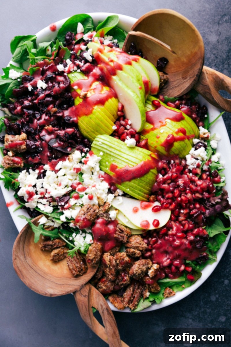 Fresh Pear Pomegranate Salad Ready to Serve A vibrant, healthy salad featuring pears, ready to be lightly tossed and served as a delightful side dish or light meal.