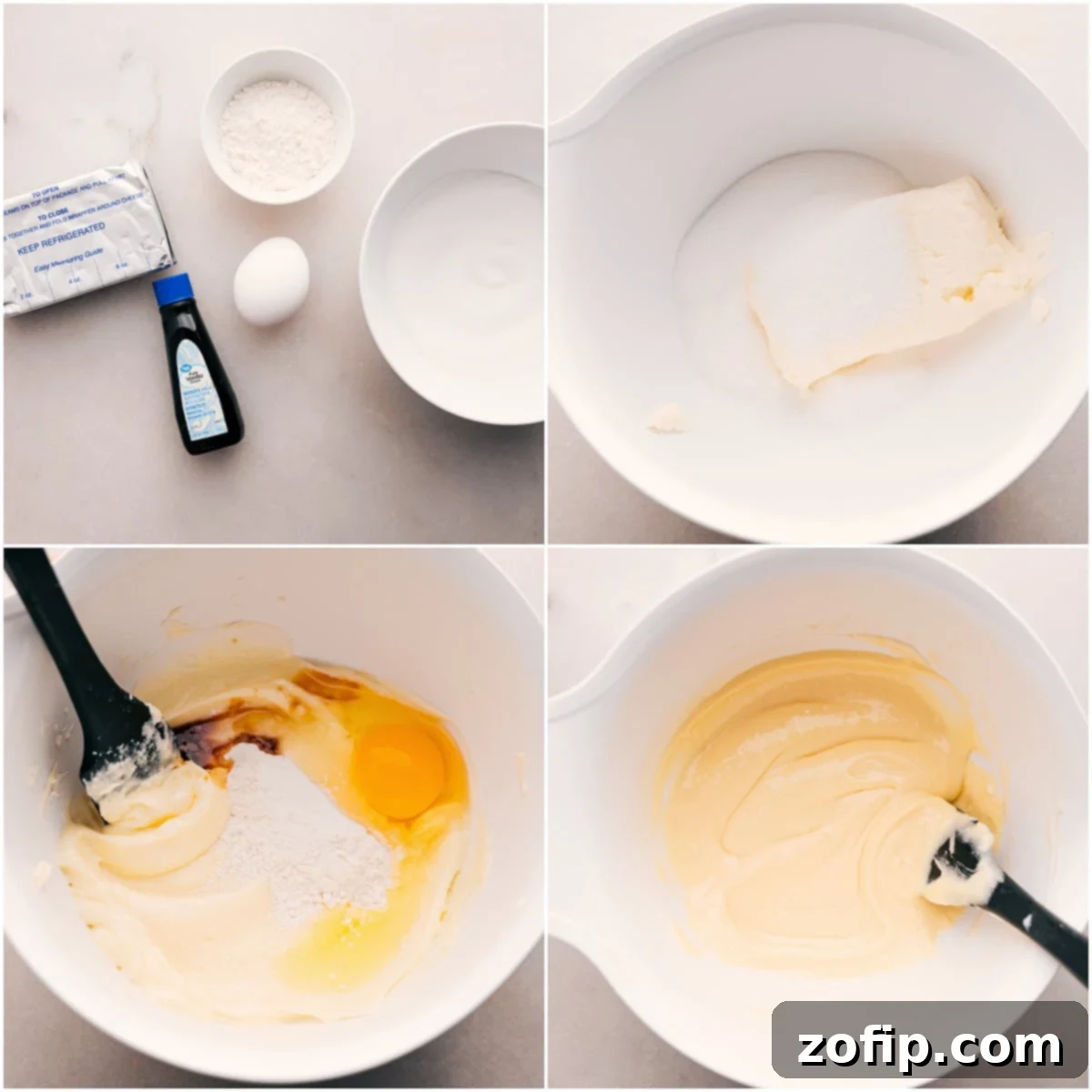 Creamy cheesecake filling being gently beaten in a bowl using electric hand mixers, preparing it for the cinnamon roll cheesecakes.