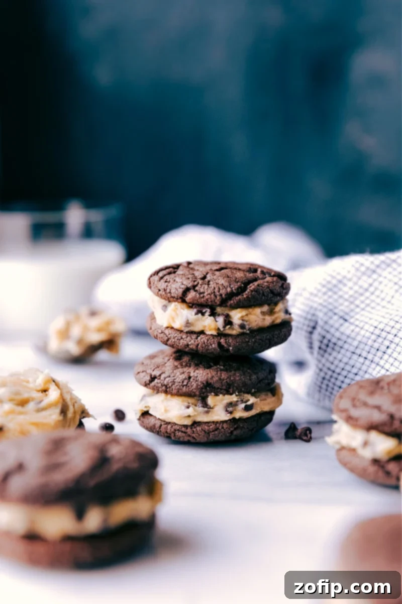 Stacked Homemade Cookie Dough Oreos, showcasing the rich chocolate cookies and creamy cookie dough filling.