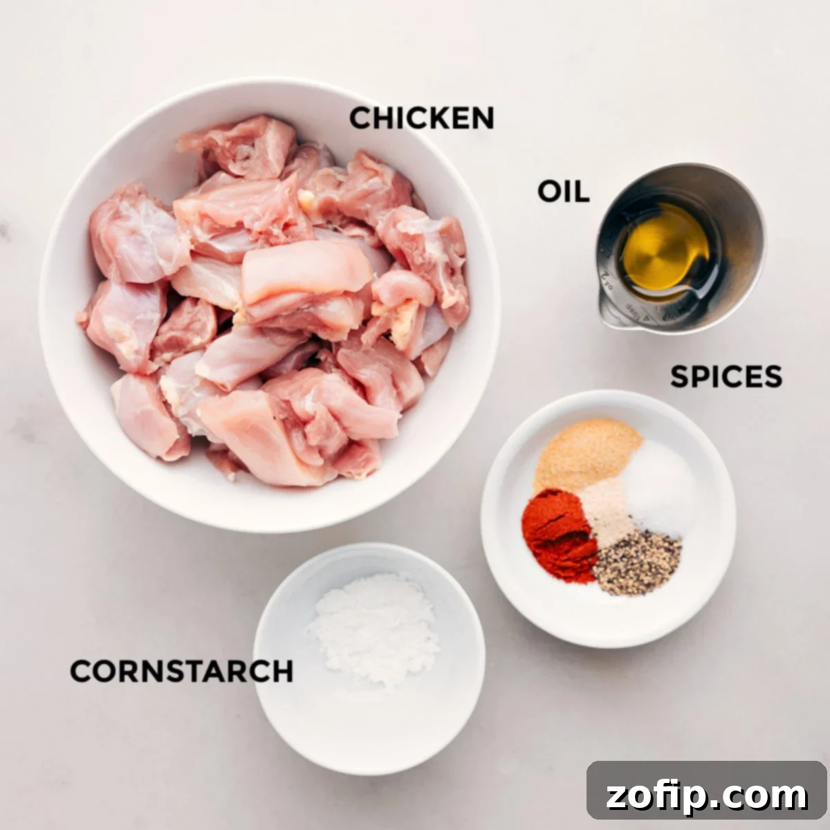 The meat is prepped with spices, oil, and cornstarch to make the recipe.