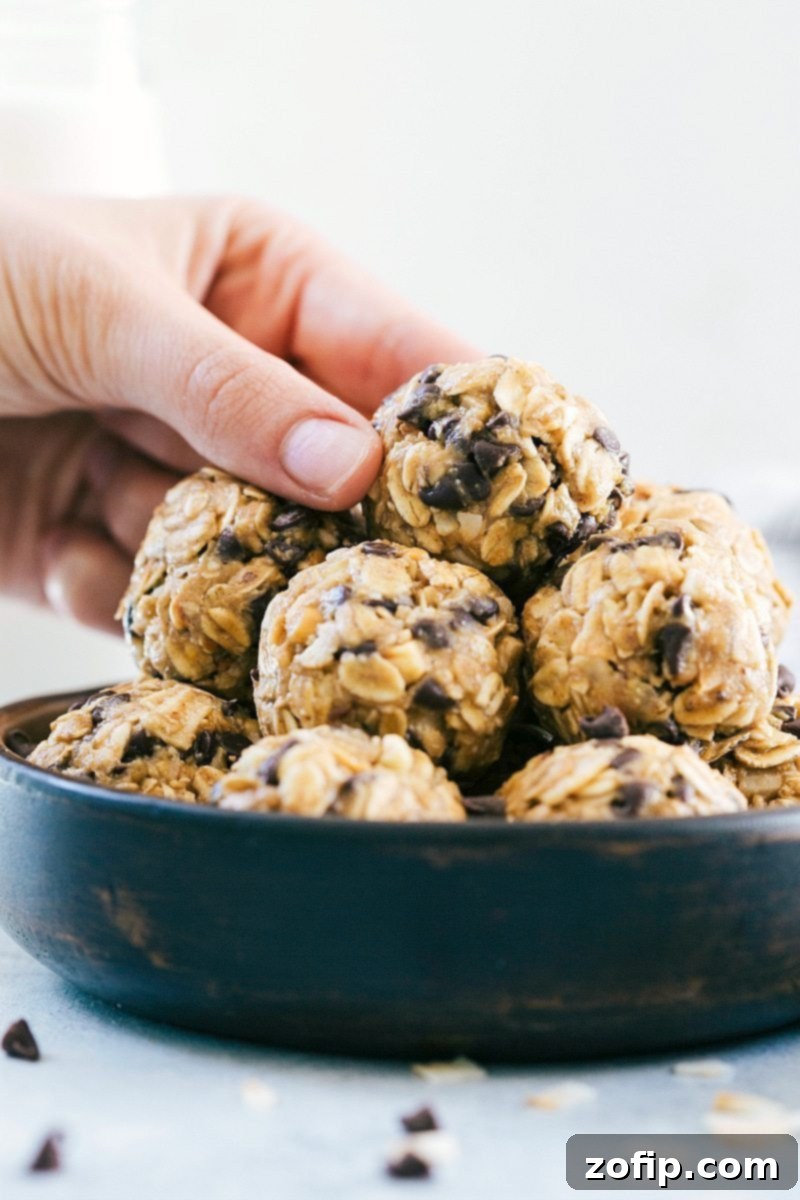 Protein-packed, granola balls -- these Energy Bites make the perfect snack or breakfast on-the-go (no baking required!). Recipe via ChelseasMessyApron.com #granola #oats #energybites #chocolate #protein #energy The ultimate BEST-EVER no-bake Energy Bites! Quick, easy, and healthy!
