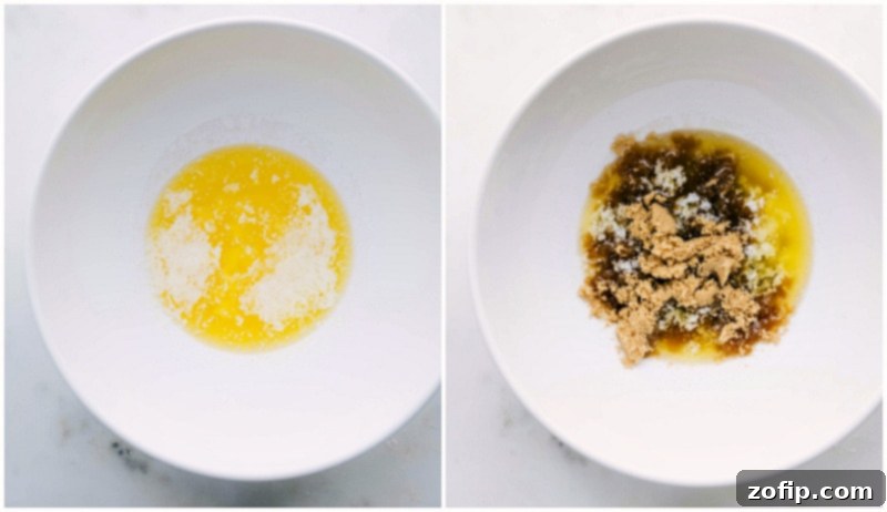 Butter and sugars being combined in a bowl.