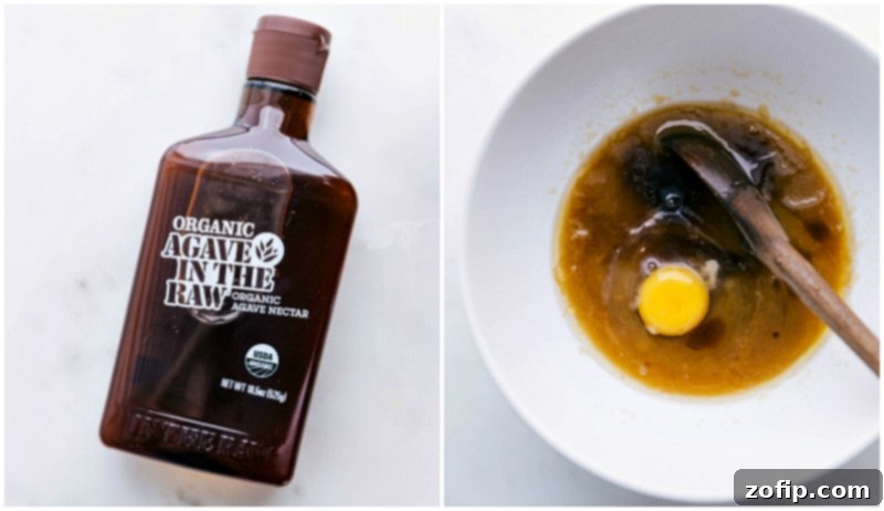 Agave bottle used in this recipe and it being added to the mixture in the bowl for the best White Chocolate Macadamia Nut Cookies.