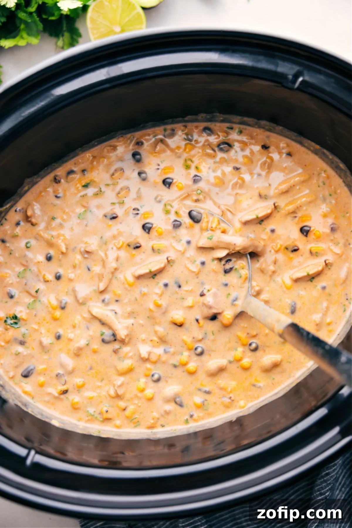 The Best Chicken Corn Chowder In The Slow Cooker Hearty and creamy Chicken Corn Chowder in a slow cooker, ready to be served and enjoyed by the family.