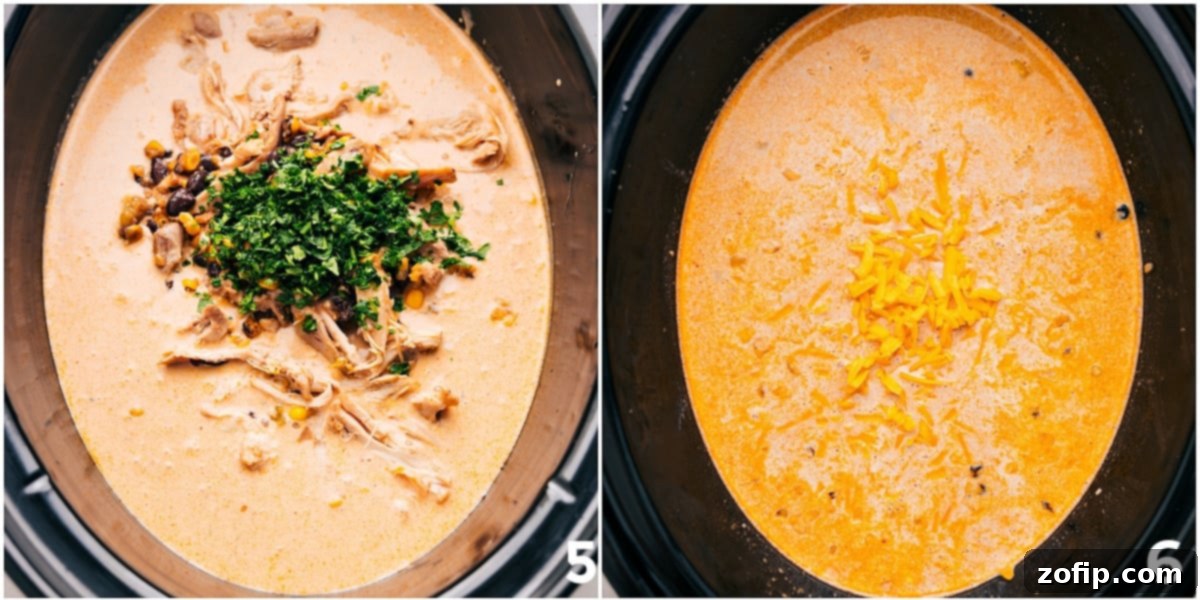 Creamy Chicken Corn Chowder Recipe Creamy Chicken Corn Chowder in the slow cooker, finished with cheese and fresh herbs, ready to be served.