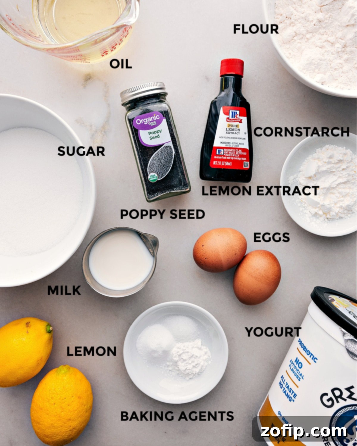 Pre-measured Ingredients for Lemon Poppy Seed Muffins Individual bowls containing pre-measured wet and dry ingredients, neatly separated and ready for baking these delicious muffins.
