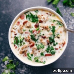 A bowl of easy Zuppa Toscana soup topped with fresh herbs, ready to be enjoyed.