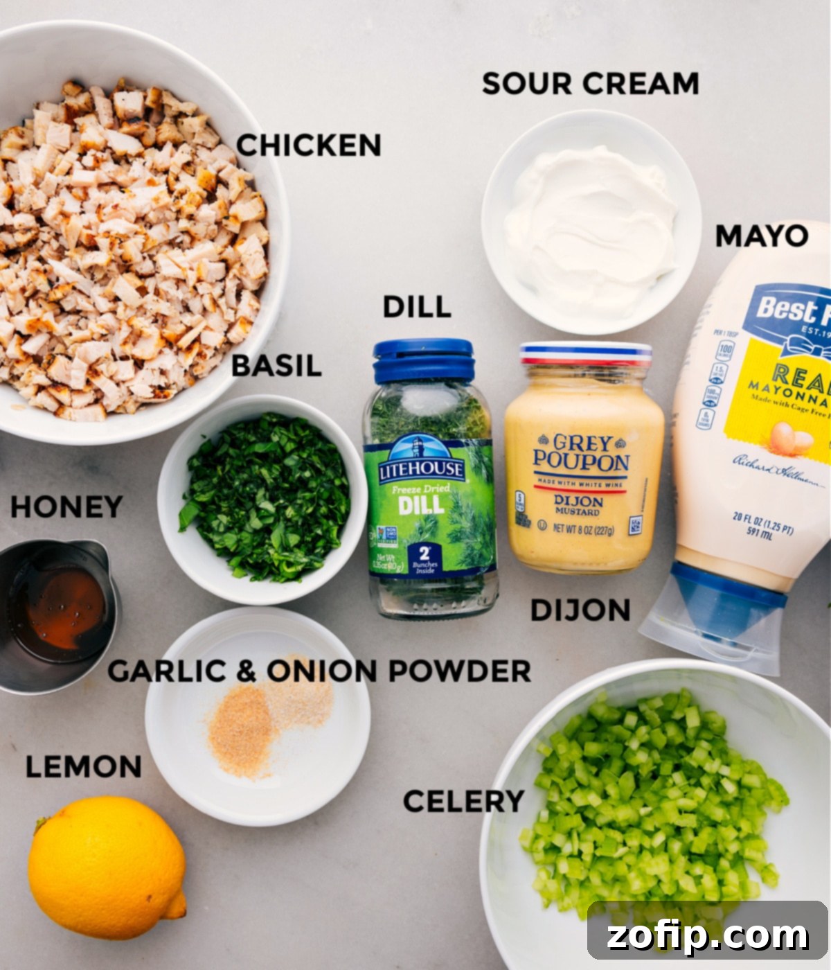 Ingredients For Fresh Lemon Basil Chicken Salad All the ingredients for this recipe are prepped and ready for easy assembly, including the meat, mayo, sour cream, dijon, herbs, celery, lemon, and honey.