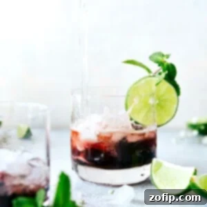 Vibrant Tart Cherry Juice Mocktail with lime and mint garnish