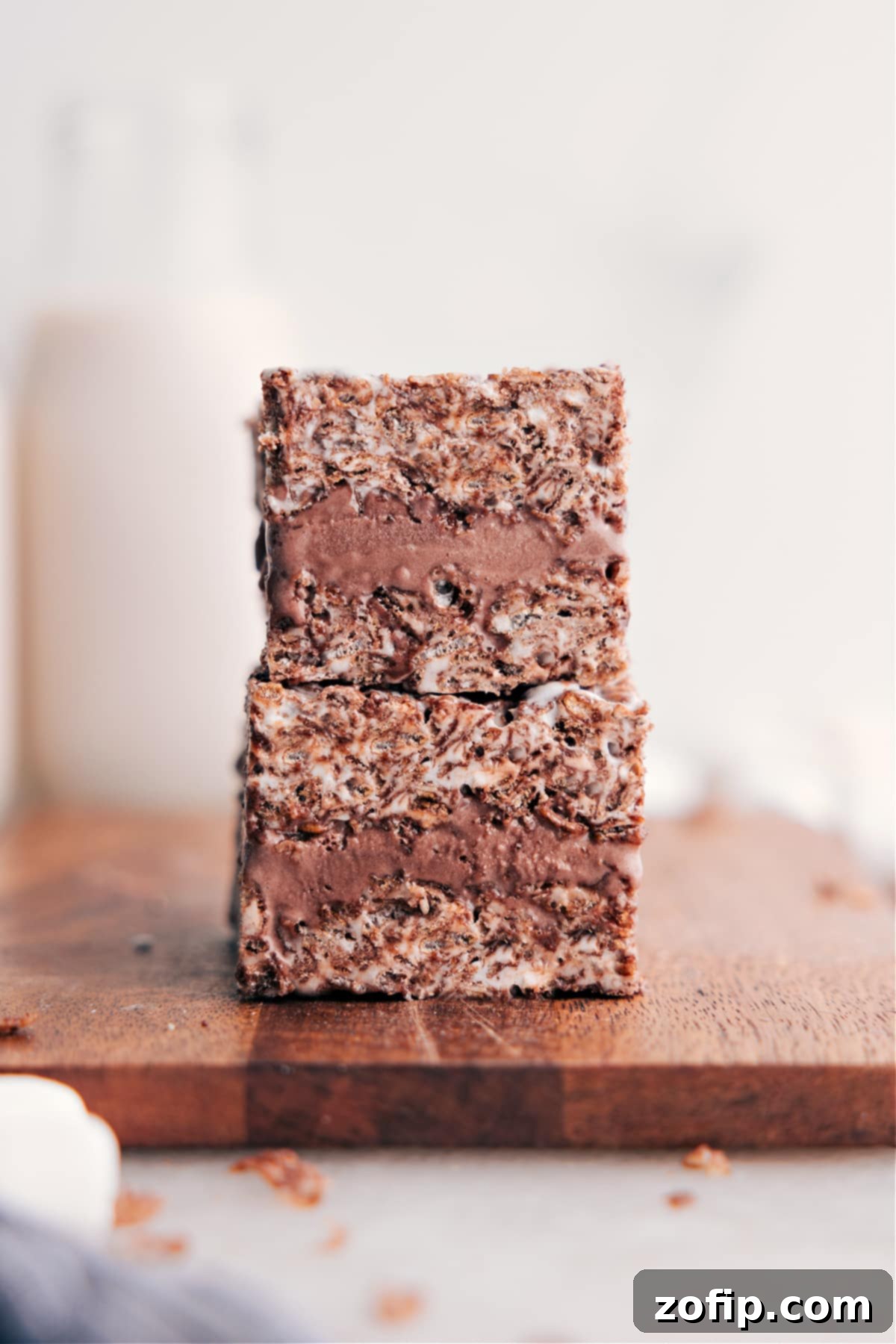 A delicious chocolate variation of the homemade Rice Krispies Treats Ice Cream Sandwiches, featuring chocolate Krispie layers and a rich chocolate ice cream filling.