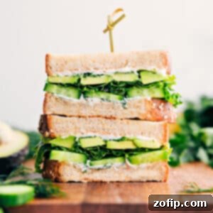 Fresh Avocado Delight 2 A freshly made avocado sandwich cut in half, showcasing its layers.