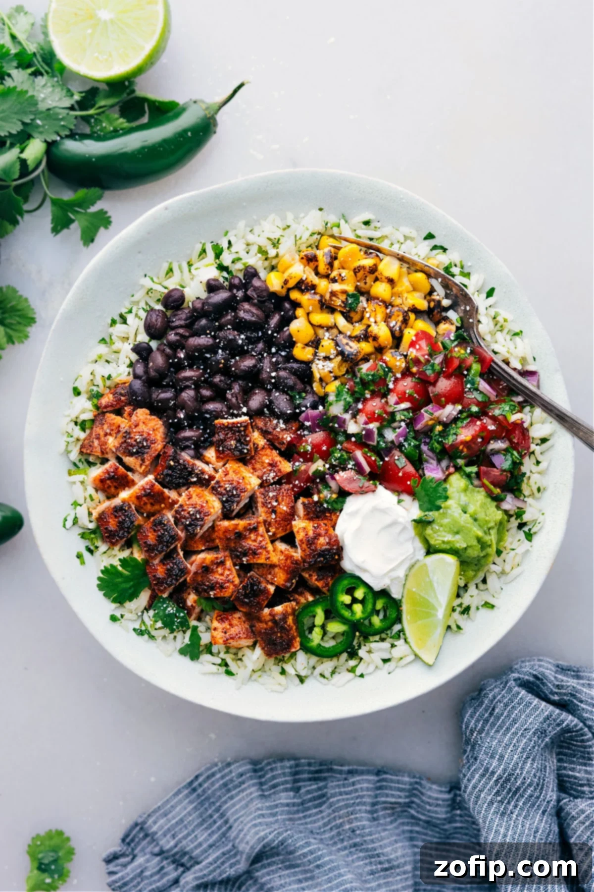 Freshly prepared Chicken Burrito Bowls with vibrant ingredients ready to be served.